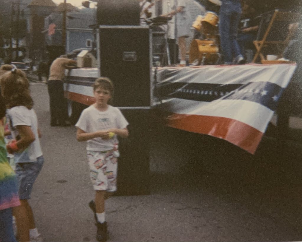 My sister walking by the festival stage